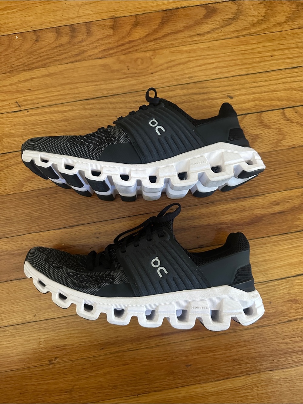 On Running men’s Black and White Cloud Sneakers